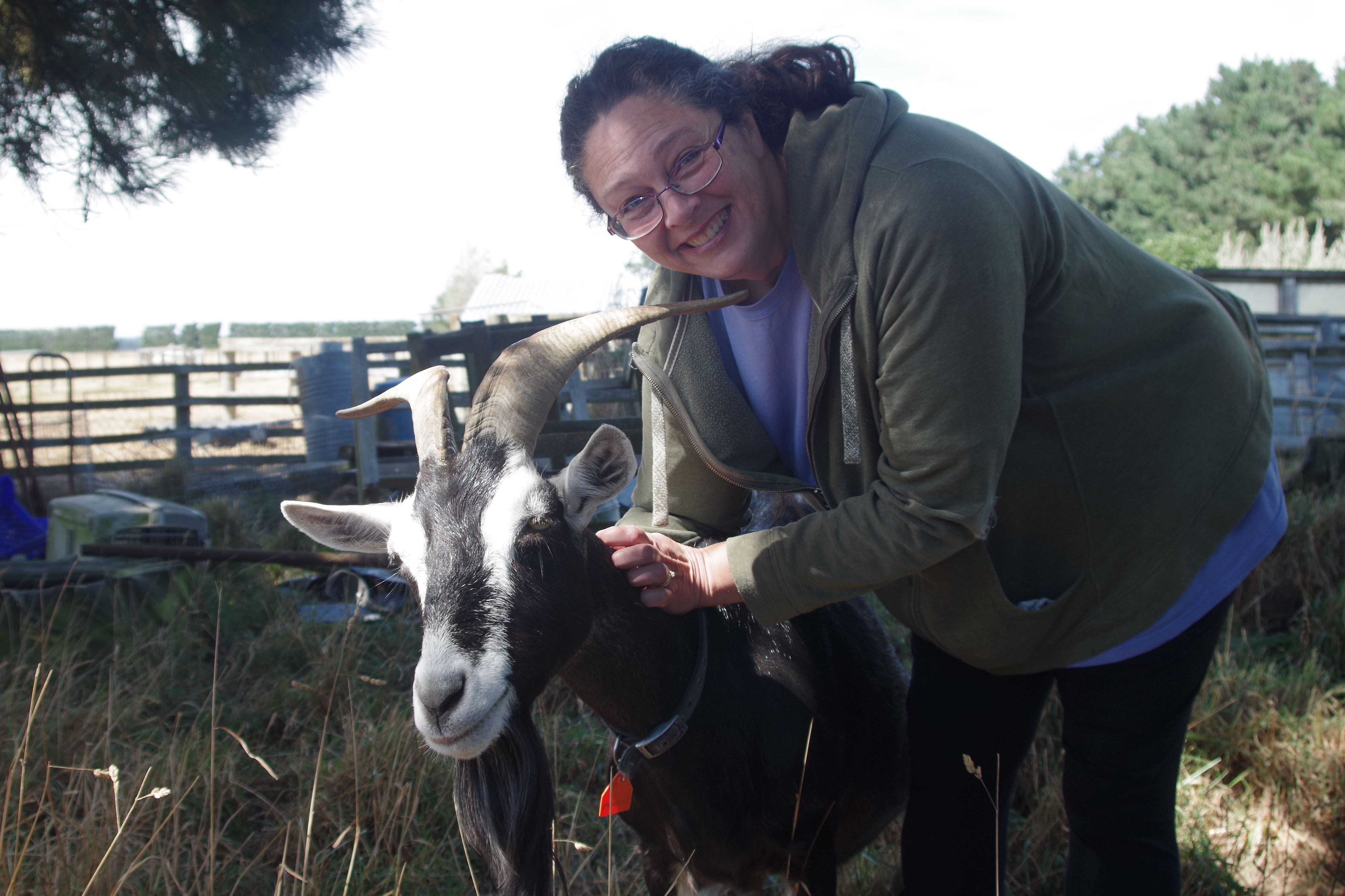 Photo of Andrea with one of her goats